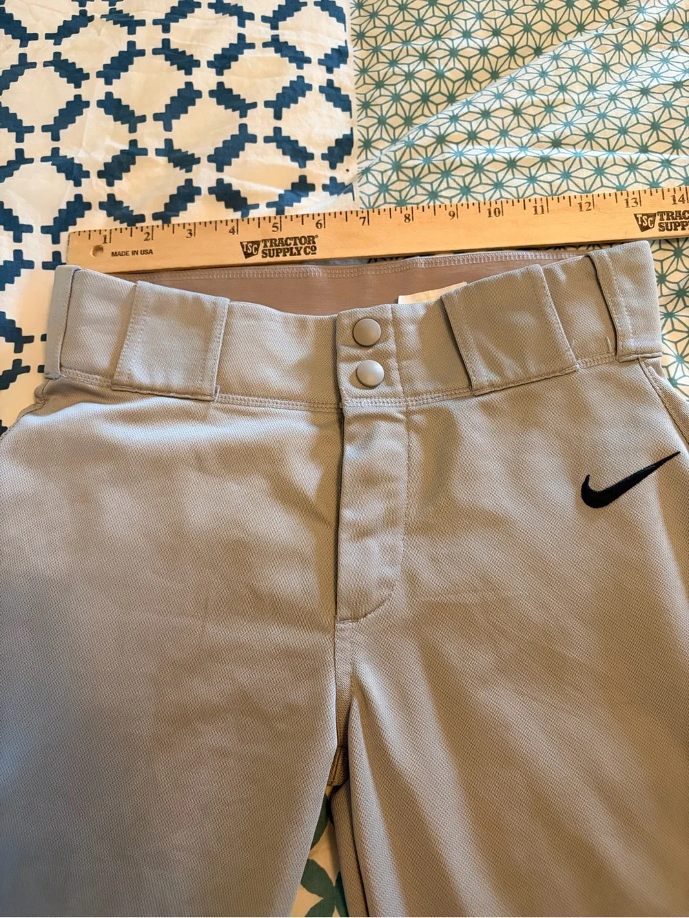 Nike Youth Large Low Waist Performance/Baseball Pants in Gray with Black Swoosh.